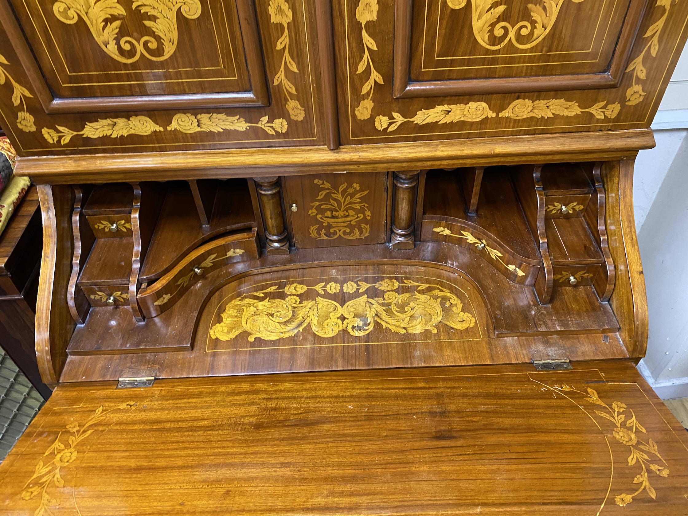 An 18th century style Dutch design marquetry inlaid bombe bureau cabinet, width 110cm, depth 64cm, height 208cm